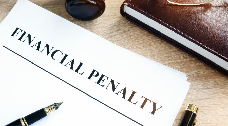 “financial penalty” written on paper