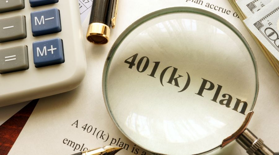magnifying glass over 401(k) plan